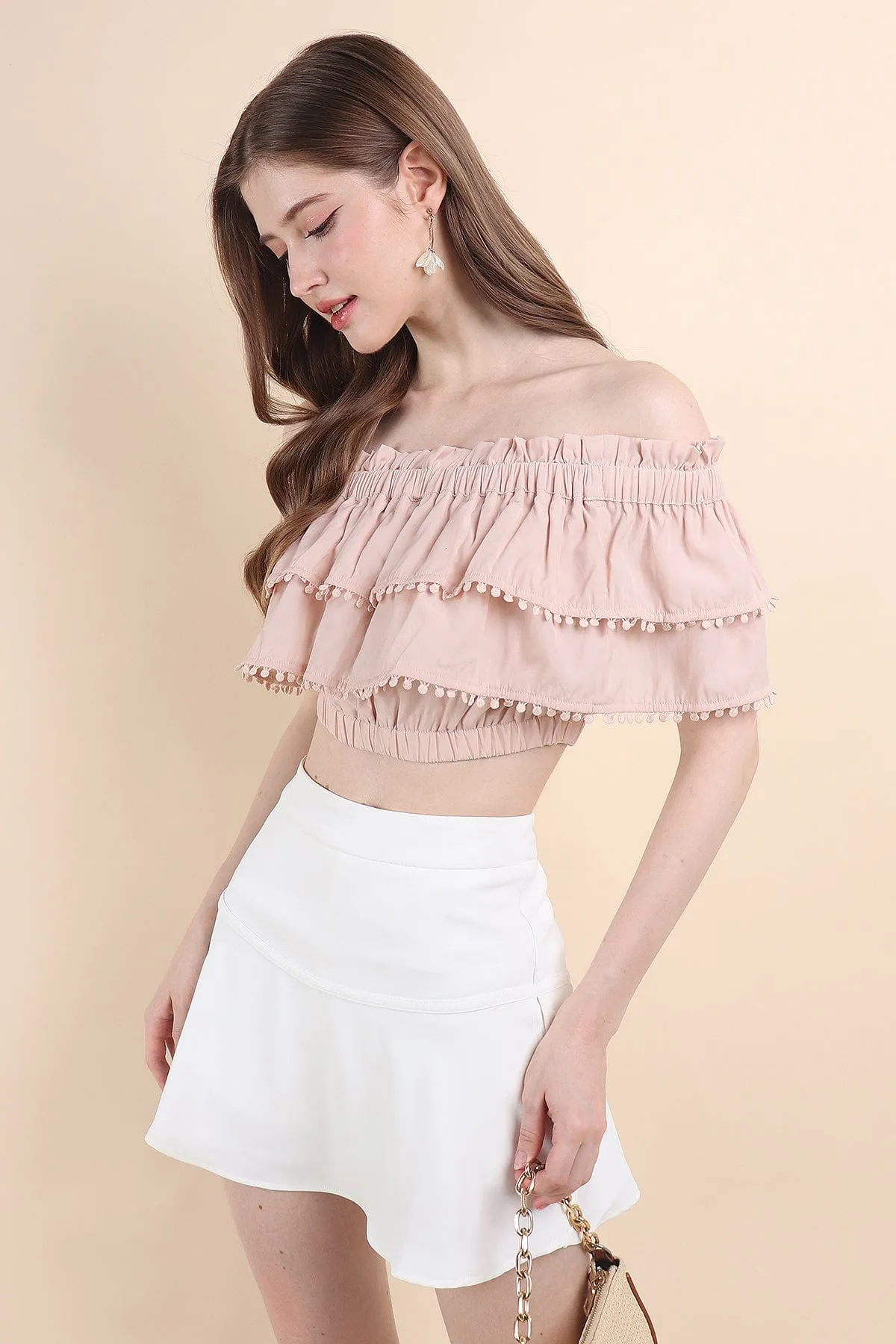 LINDSAY POM POM OFFSIE TOP IN PINK BEIGE