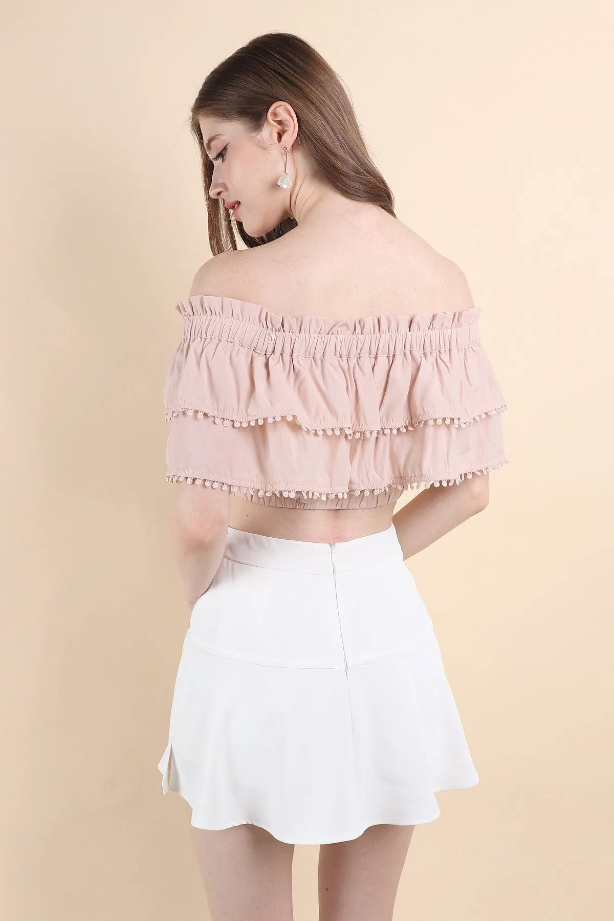 LINDSAY POM POM OFFSIE TOP IN PINK BEIGE