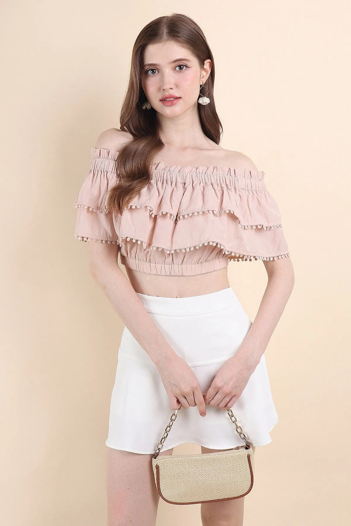 LINDSAY POM POM OFFSIE TOP IN PINK BEIGE