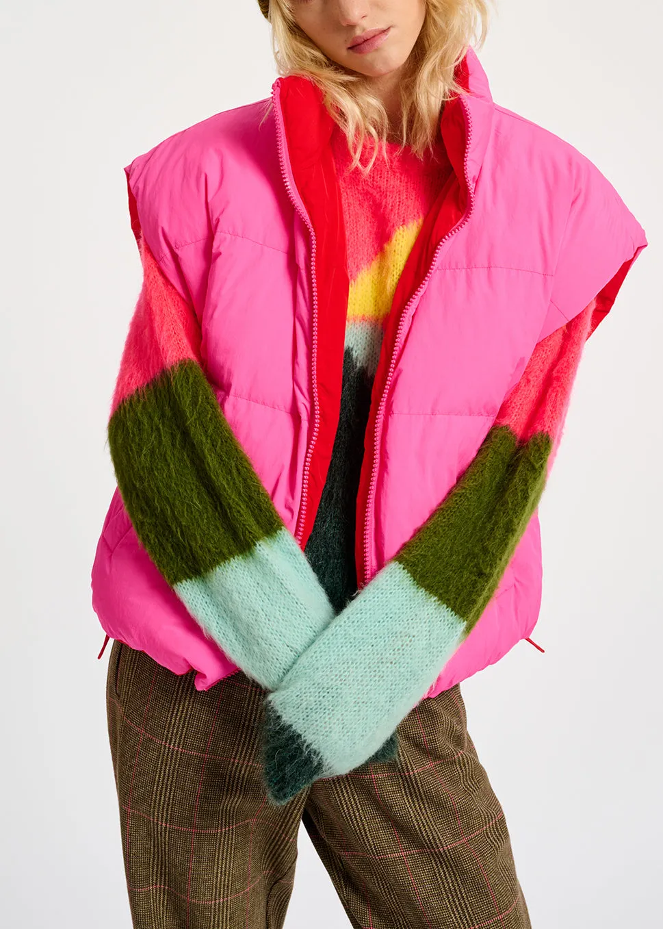 Neon pink and red reversible puffer vest