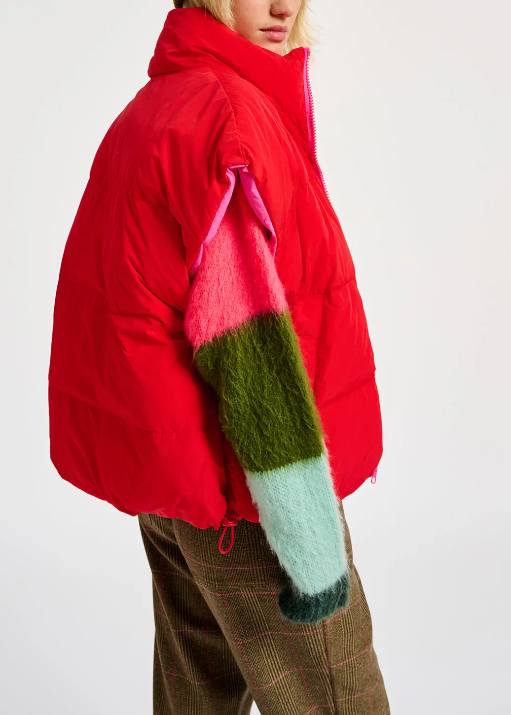 Neon pink and red reversible puffer vest
