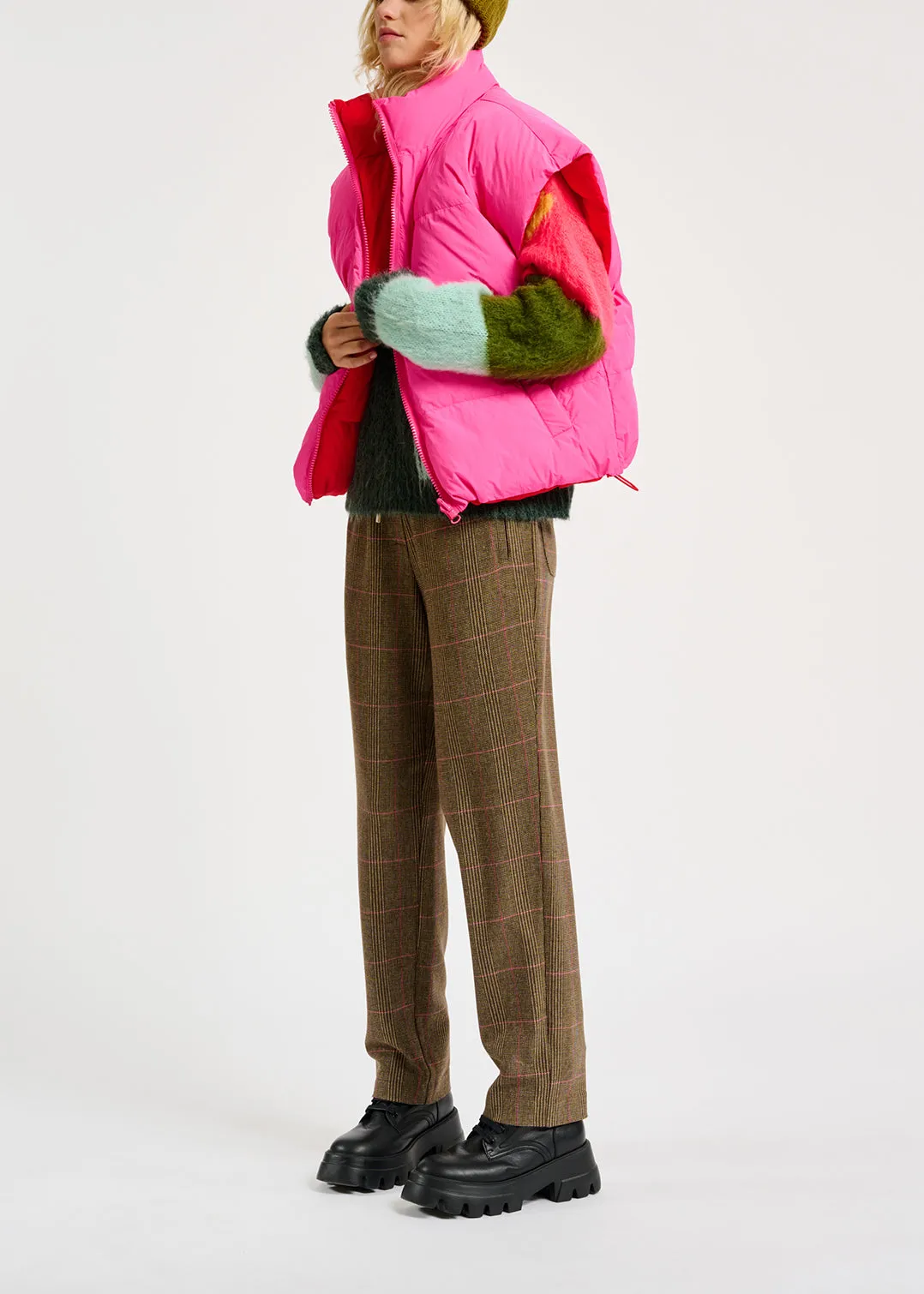 Neon pink and red reversible puffer vest
